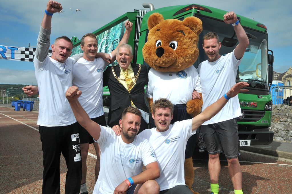 NRC 2018 racing in action; The winning team with Chairman of North Somerset Council, Cllr David Jolley and the NRC mascot, Norris the Bear; Runners up Biffa and Cartwrights.